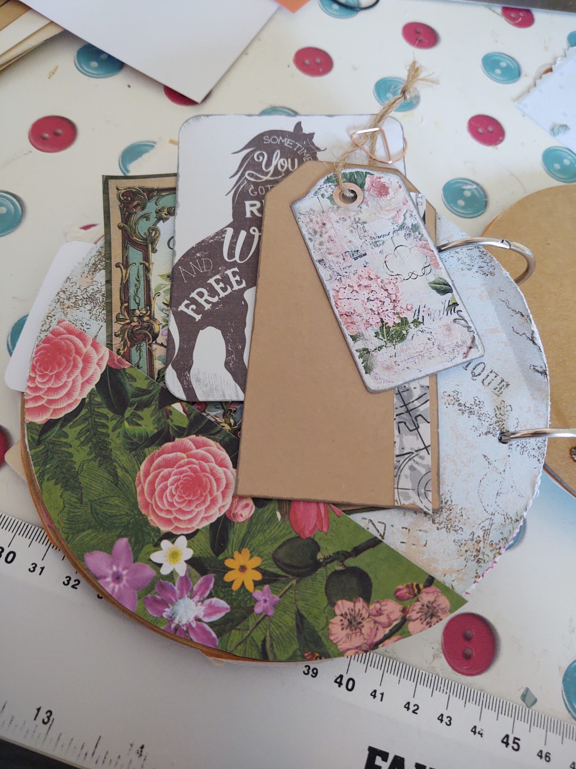 A junk journal page – flowers and unicorns and vintage look ephemera