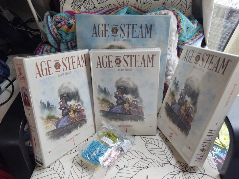 Age of Steam Deluxe with 3 expansion volumns plus wooden trains