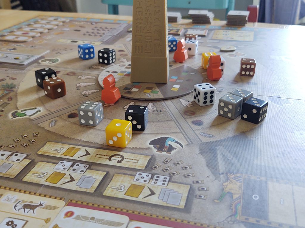 Dice around the obelisk ready to draft